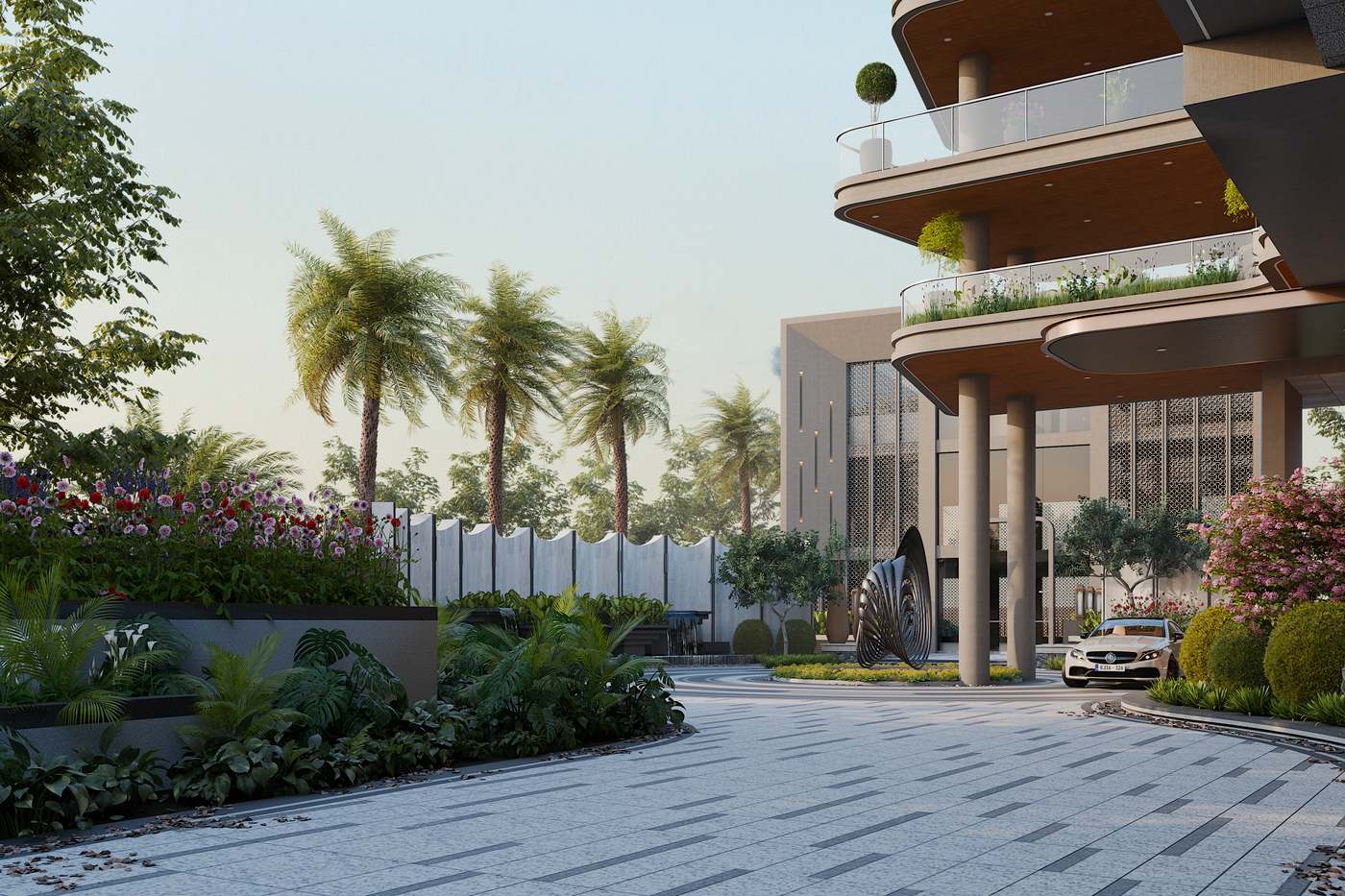 Sculptural arrival courtyard with a circular drive and landscaped islands